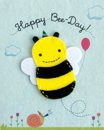 Toy bee with 'Happy Bee-Day!' text on a light blue background
