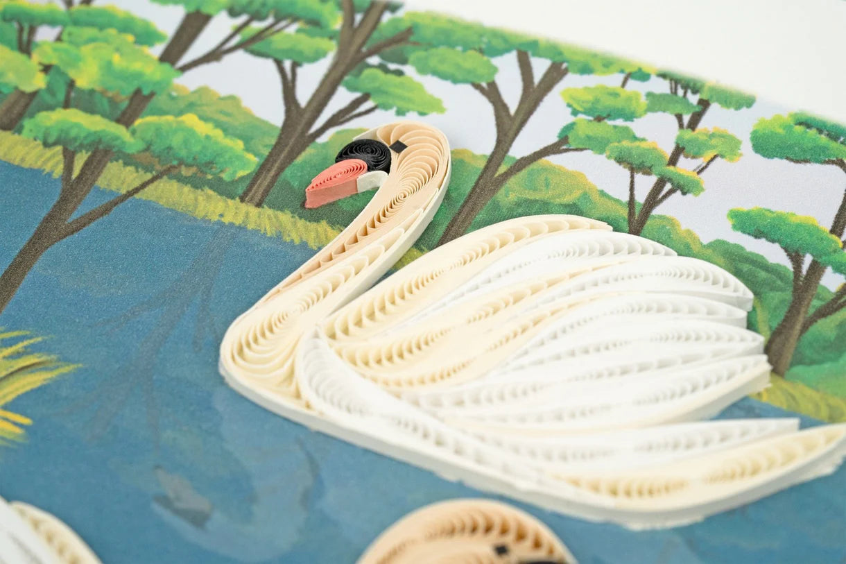 Close up of Greeting Card with two quilled swans as they float along the water.