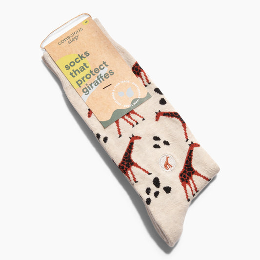 Socks with giraffe design and packaging labeled 'socks that protect giraffes' on a white background