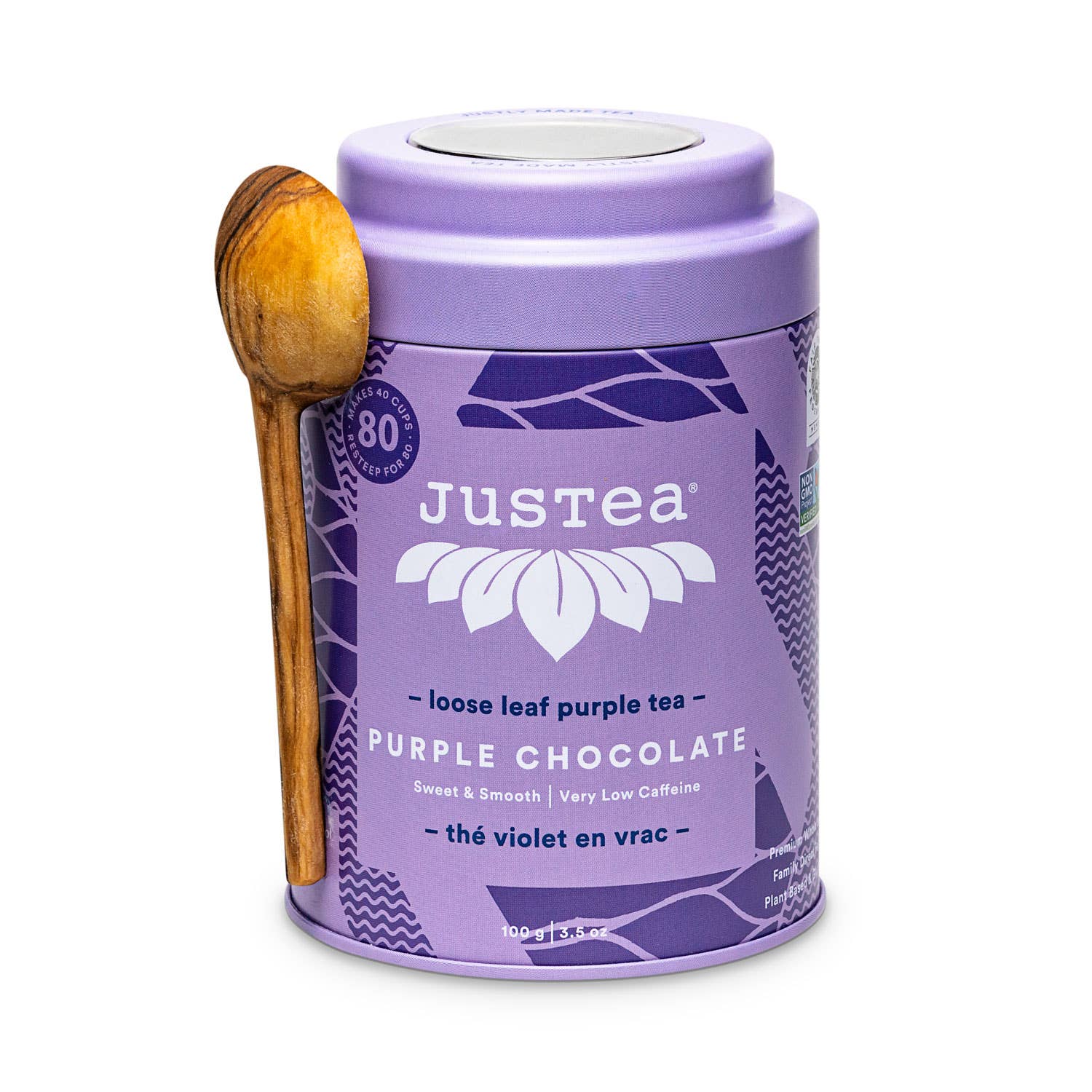 Justea purple chocolate tea canister with a wooden spoon on a white background