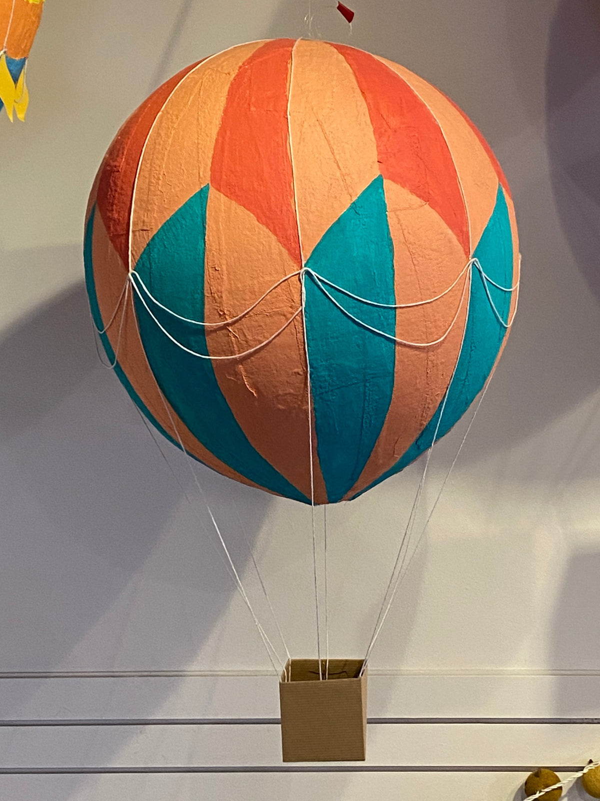 Teal and orange chevron stripe plaster of paris hot air balloon.