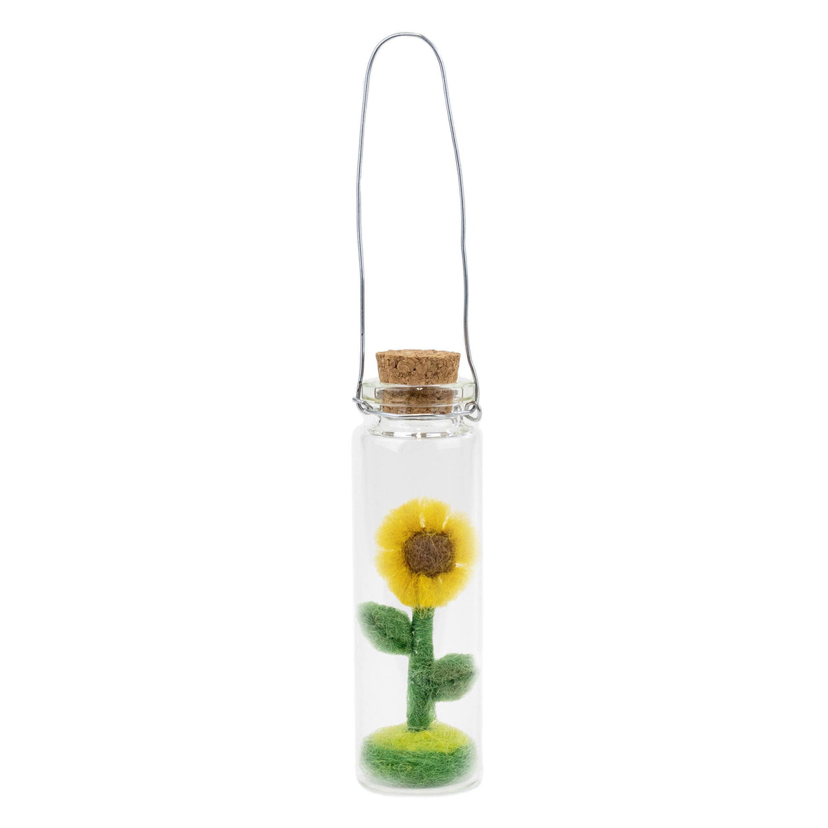Decorative sunflower in a glass bottle with cork lid on a white background