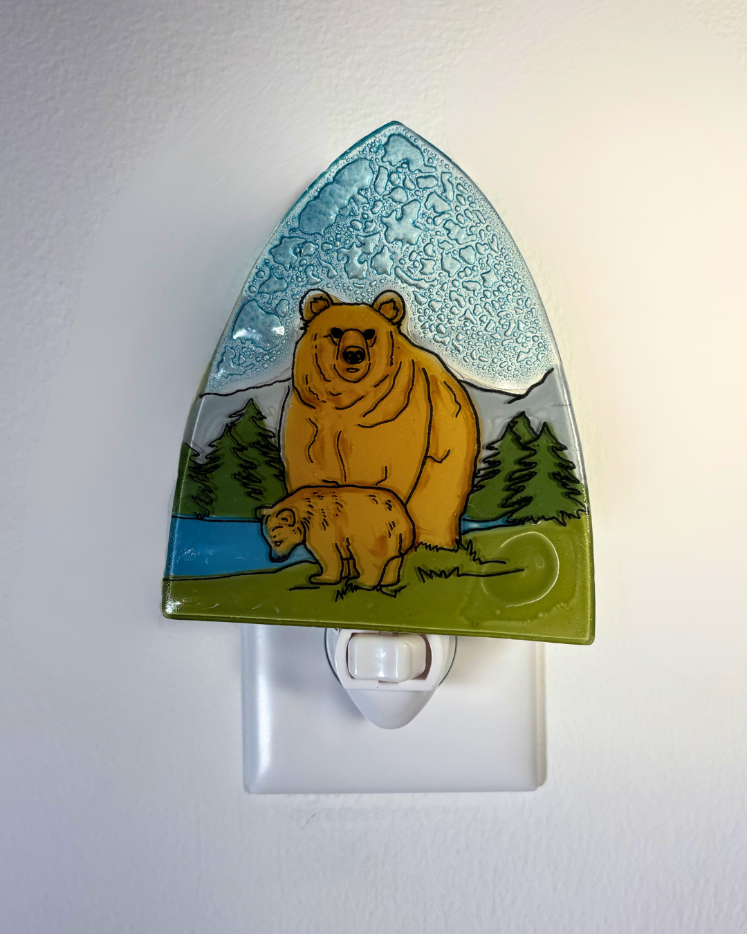 Night light with bear design on a white background