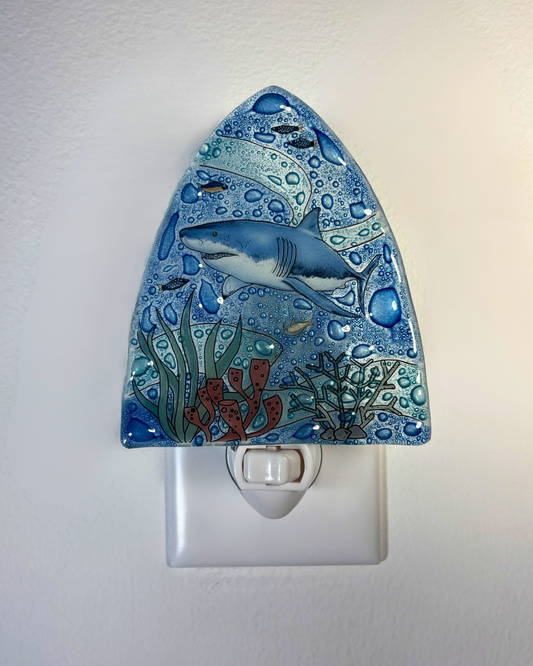 Decorative night light with shark design on a white background