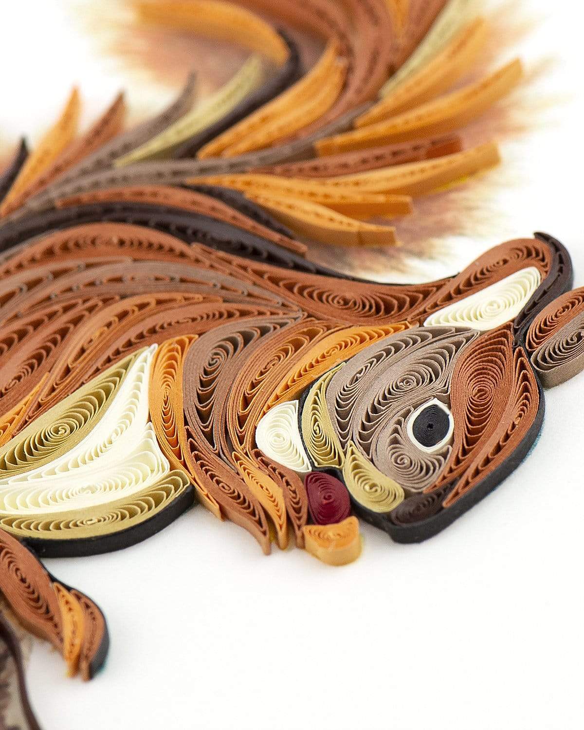 Quilled paper art of a turkey with intricate patterns on a white background