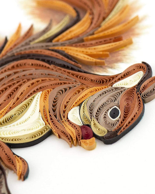 Quilled paper art of a turkey with intricate patterns on a white background