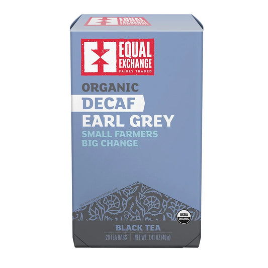 A box of Equal Exchange Organic Decaf Earl Grey black tea, featuring a light blue packaging design with a red and white logo and a dark gray pattern at the bottom.