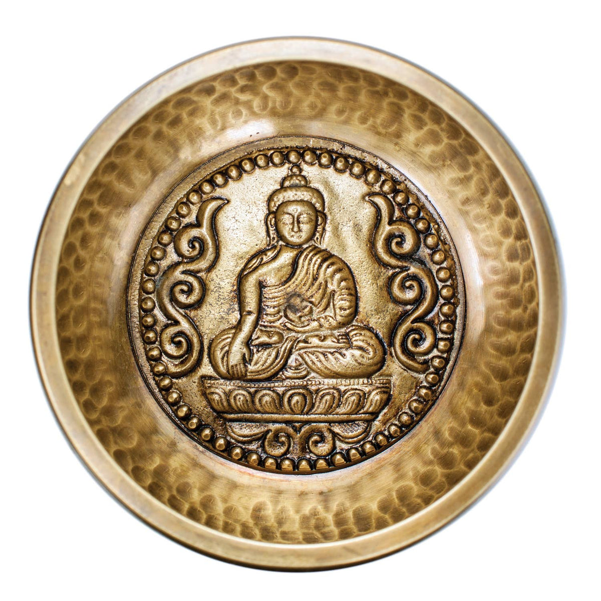 Brass bowl with Buddha emblem on a white background