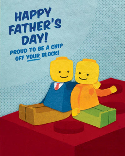 Father's Day card with two cartoon characters sitting on a red surface, text 'Happy Father's Day! Proud to be a chip off your block!' on a blue background.