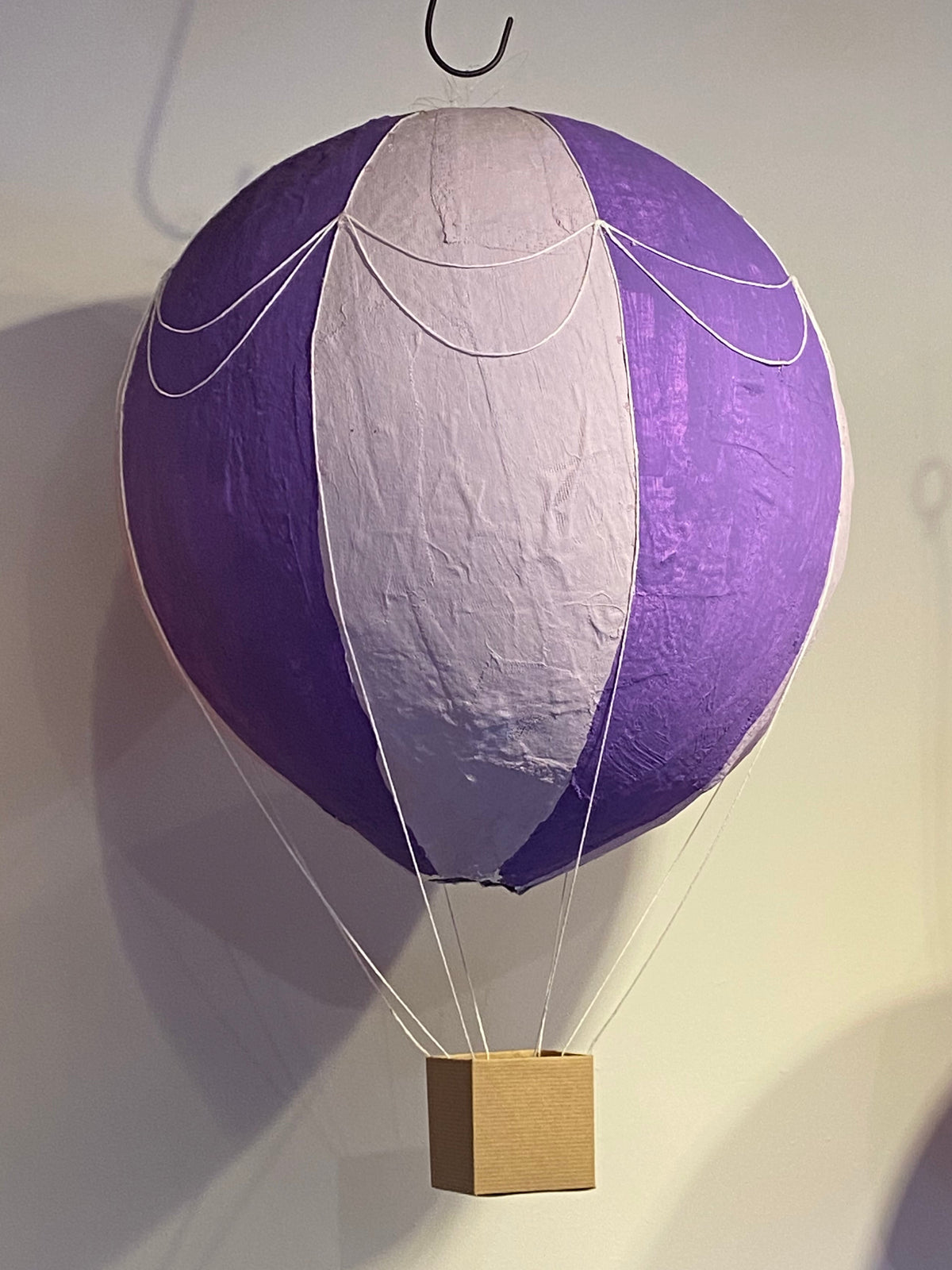 Purple and lavender striped plaster of paris hot air balloon.