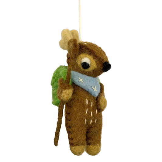 Felted deer ornament with a green backpack, blue bandana and hiking stick on a white background