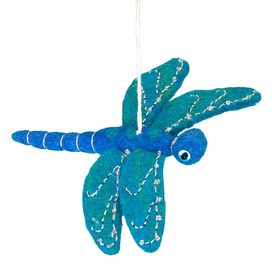 Blue dragonfly ornament on a white background