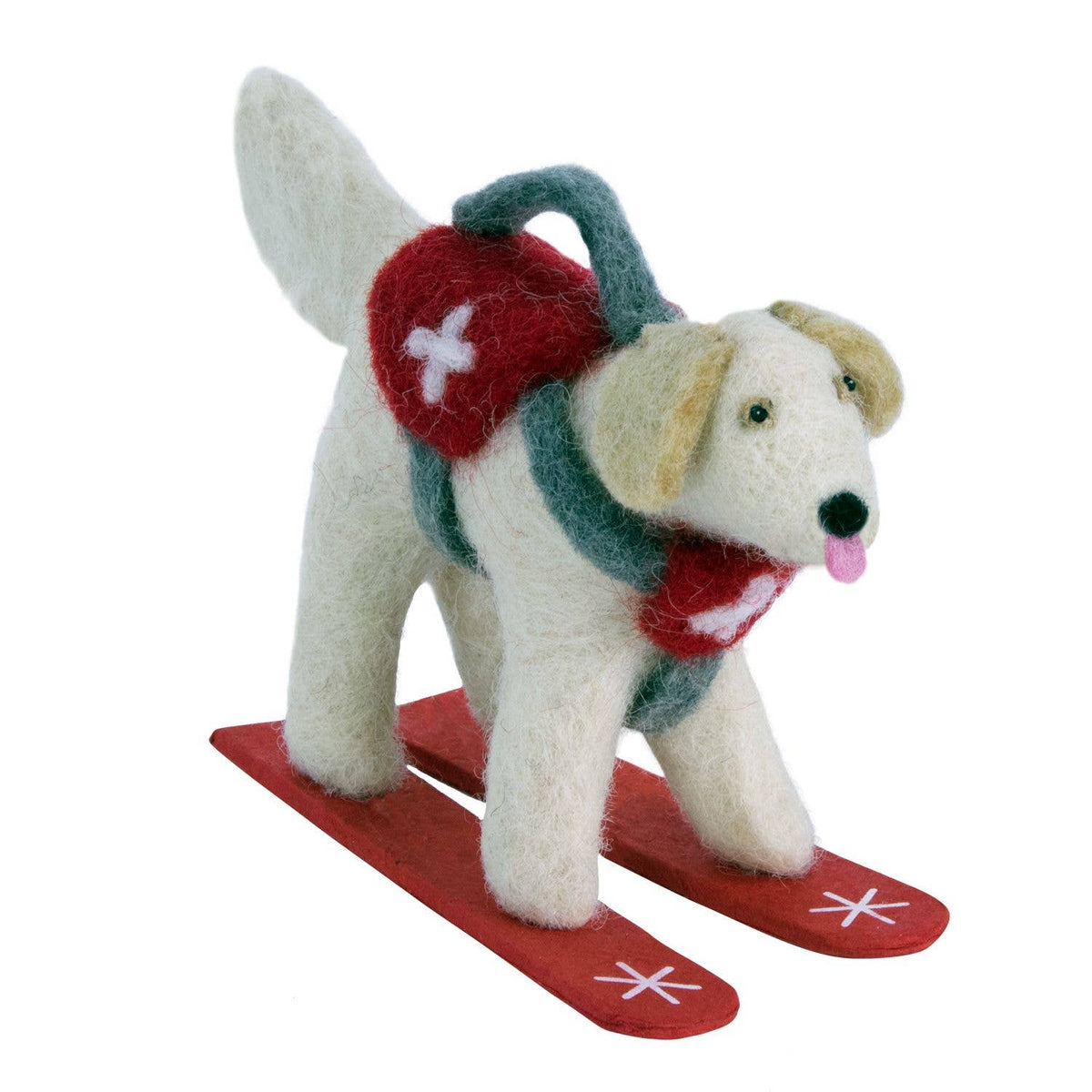 Felted dog toy on skis with a backpack on a white background