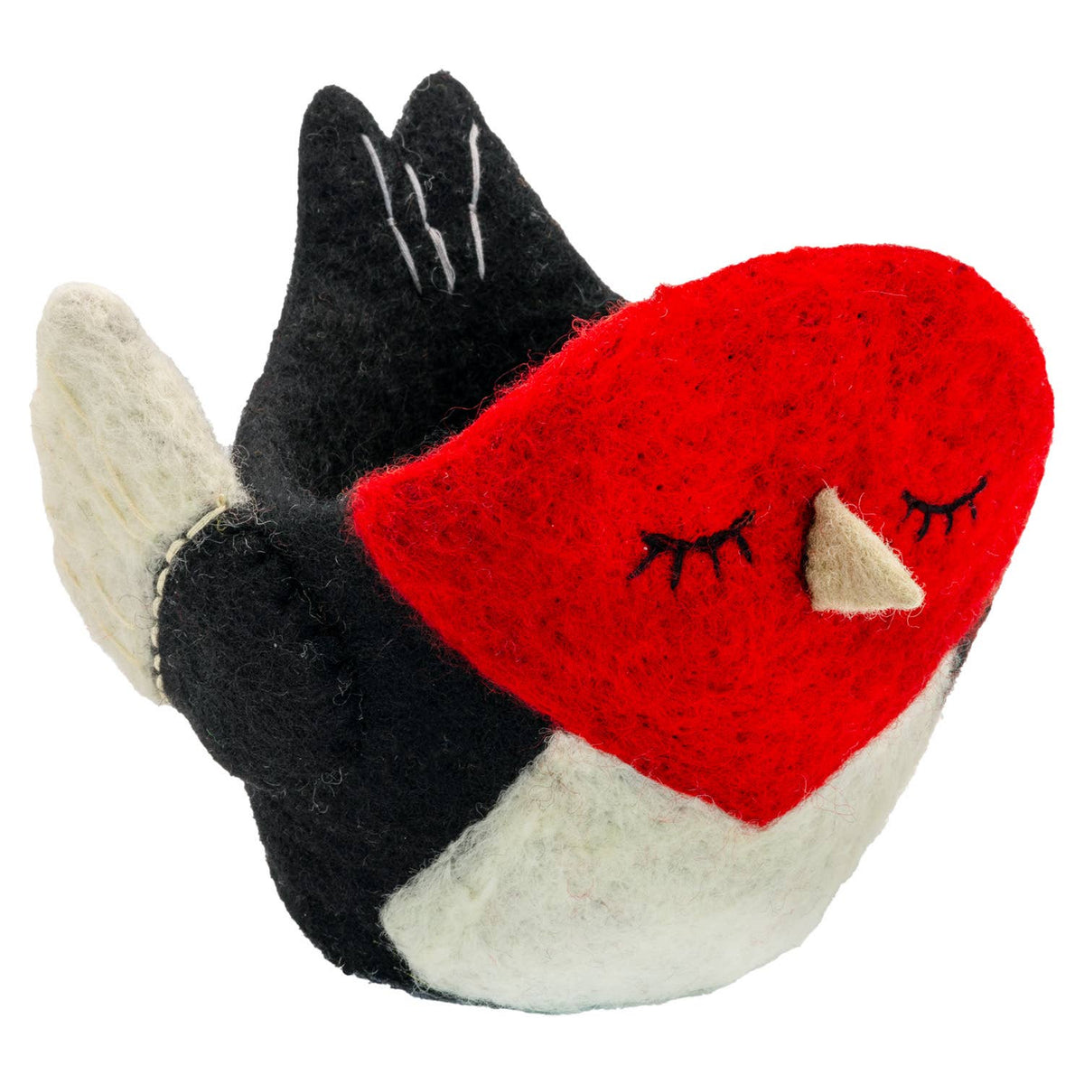 Felted plant pot resembling a woodpecker with a red face, black wings, and white body on a white background.