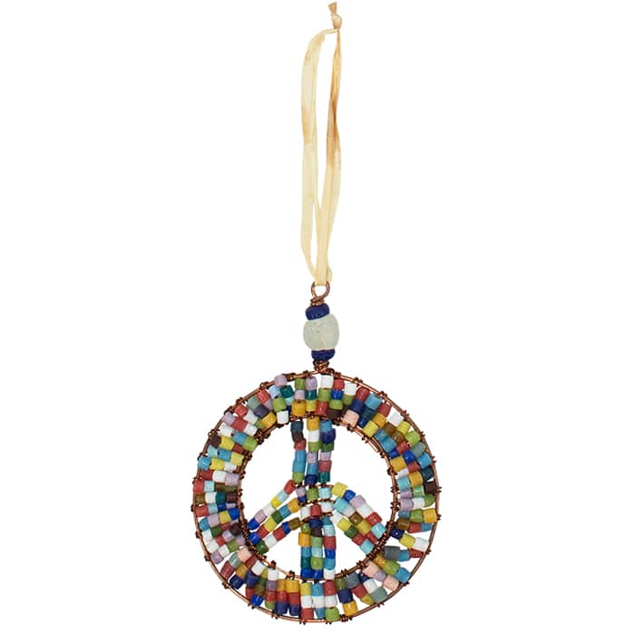 A peace sign shaped rainbow beaded ornament made from recycled glass.