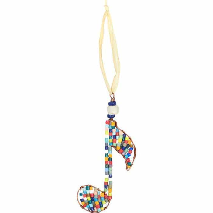 A single music noted shaped ornament made with rainbow recycled glass beads hanging on a piece of raffia.