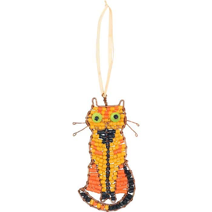 A orange tabby cat ornament made from recycled glass beads with a raffia string.