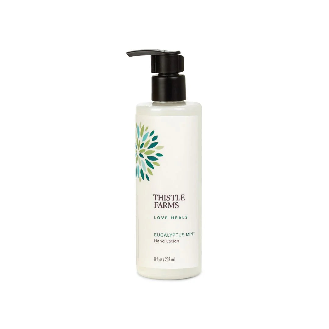 Thistle Farms Eucalyptus Mint hand lotion bottle on a white background