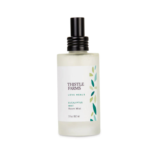 Thistle Farms room mist bottle on a white background