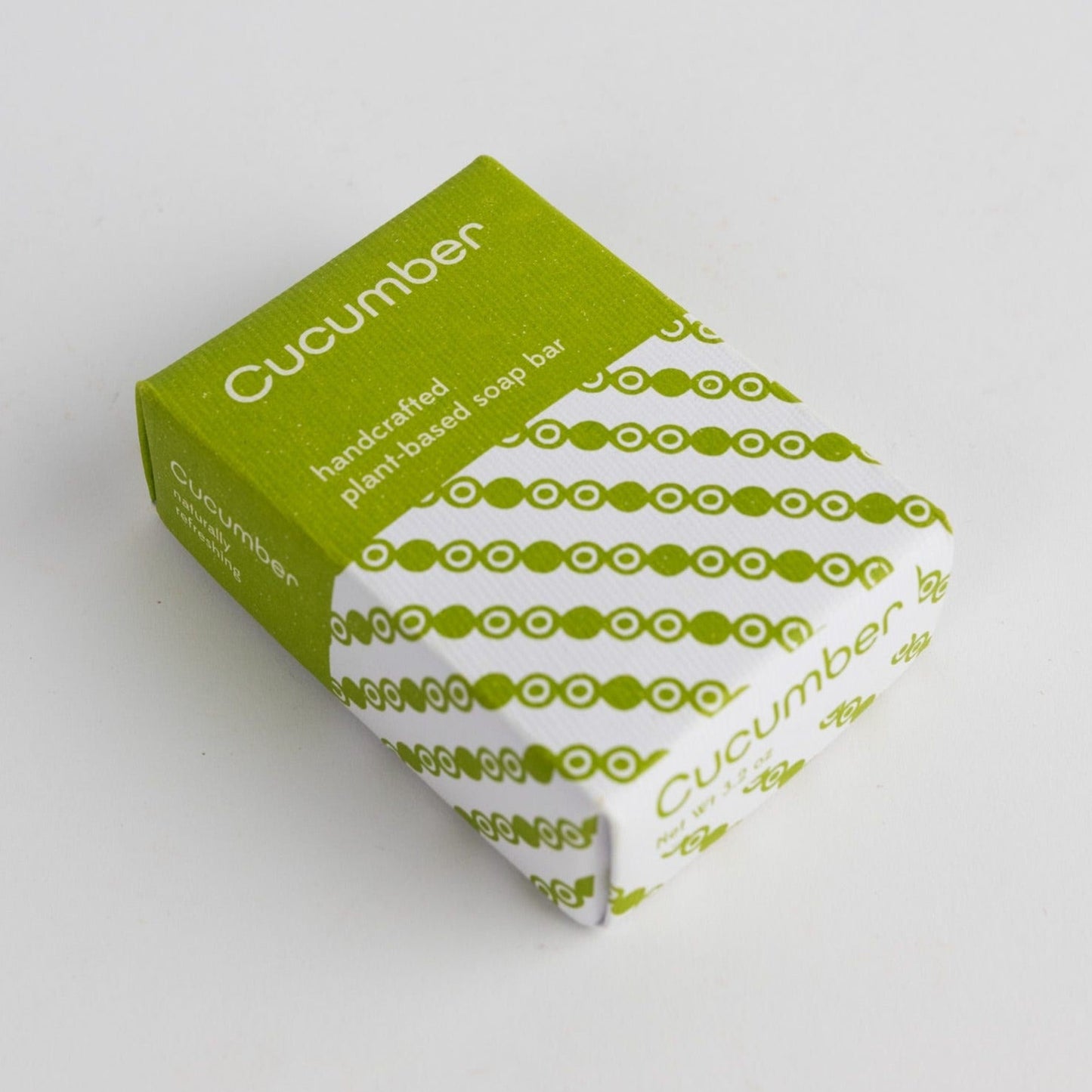 A green and white patterned box with the word "Cucumber" is on a white background.