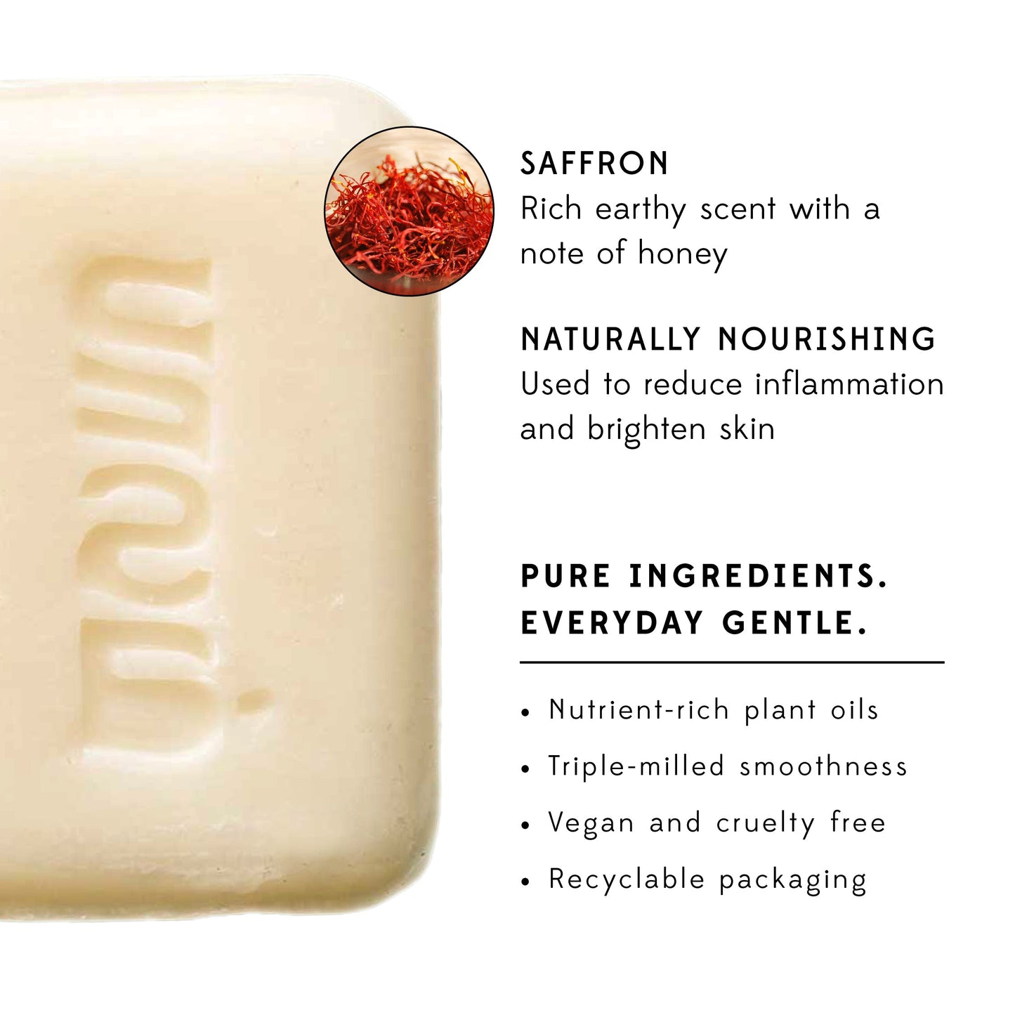 A bar of white soap on a white background that features information about the benefits of saffron soap.