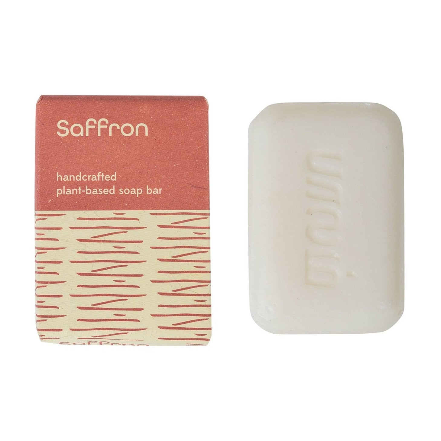 A bar of soap with a pink and brown label that reads 'Saffron' and 'Handcrafted Plant-Based Soap Bar'. The packaging has a patterned design and the brand 'Ten Thousand Villages' is visible.