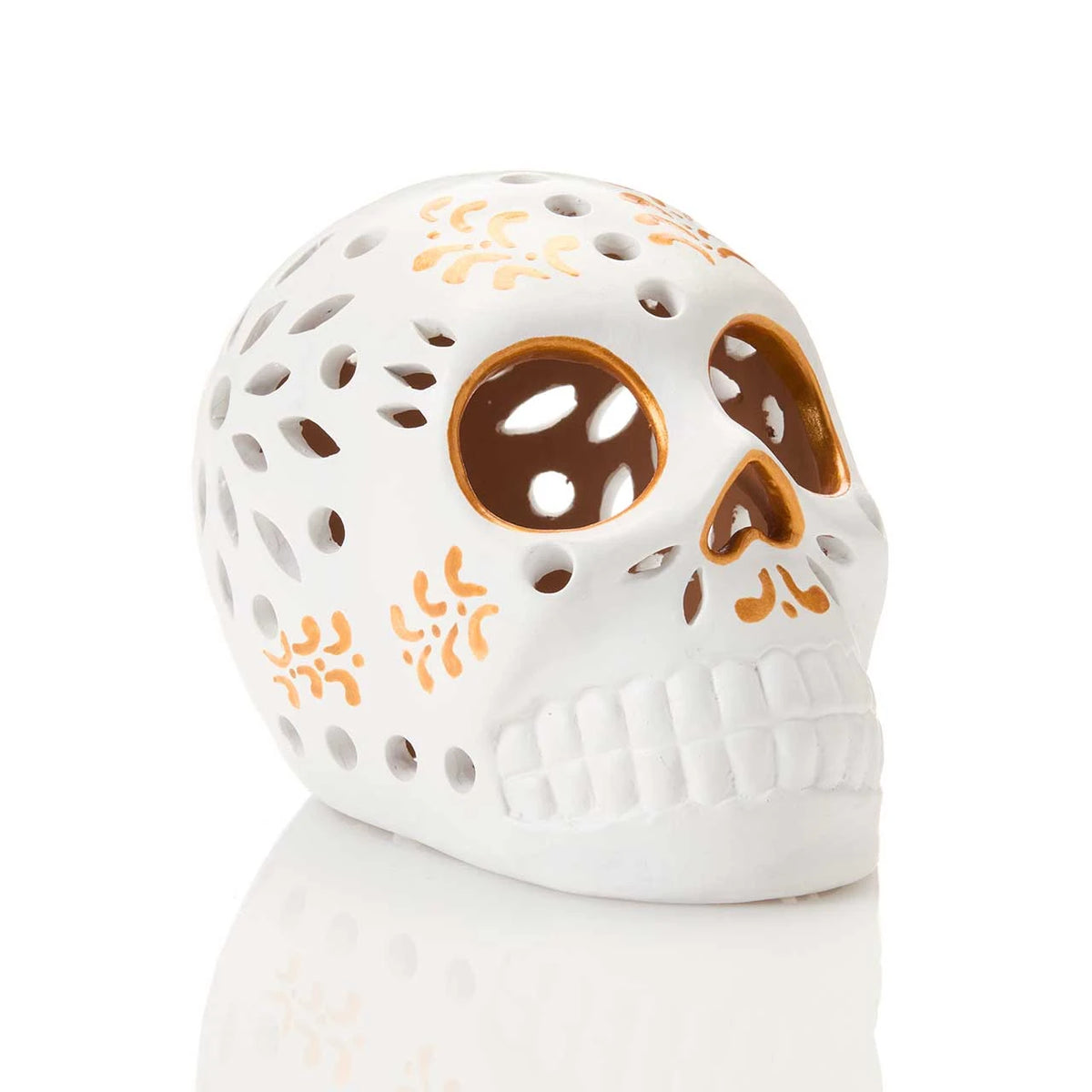White Terracotta skull lantern with gold decoration on a white background