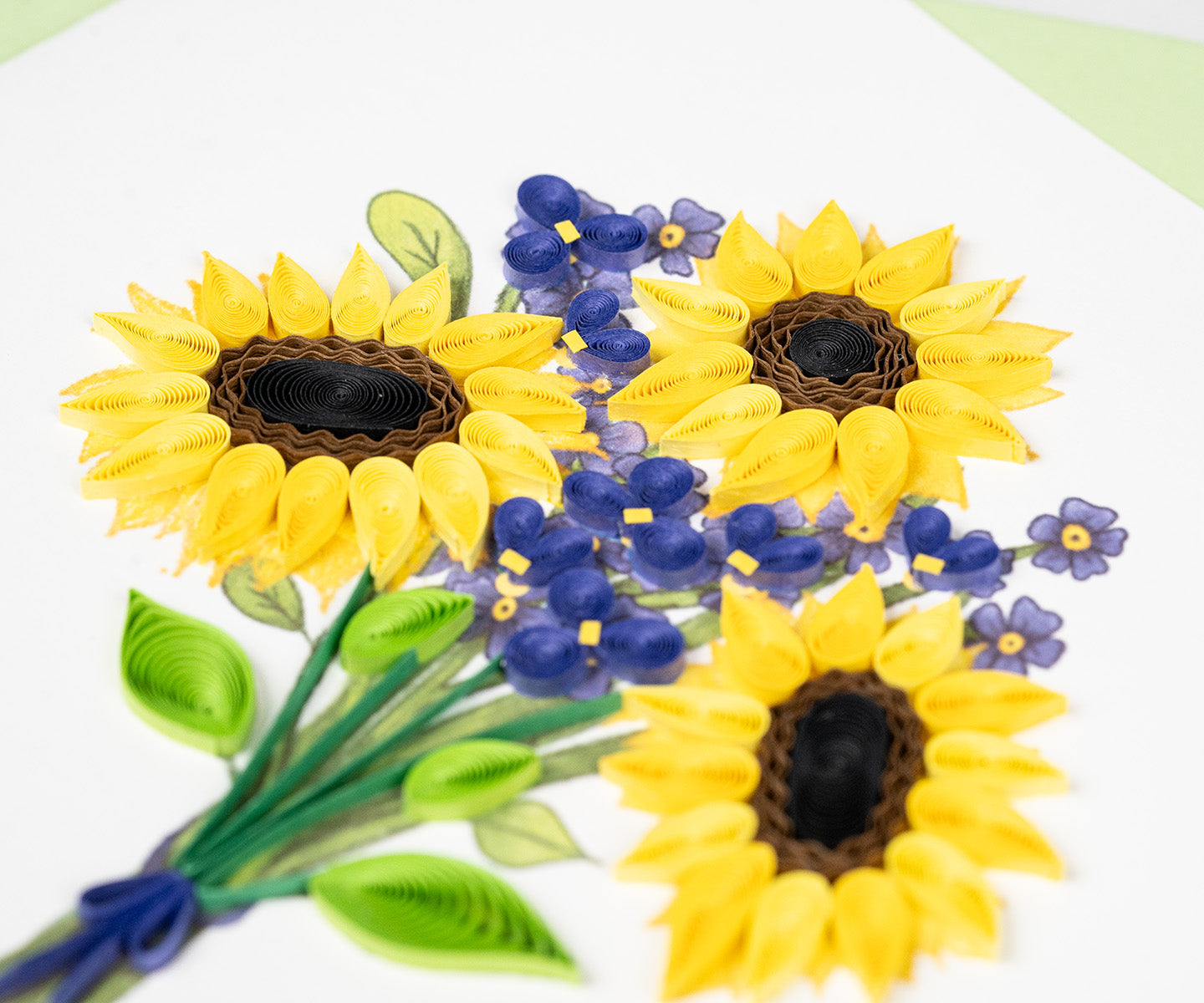 Greeting card with yellow sunflowers and purple flowers on a white background