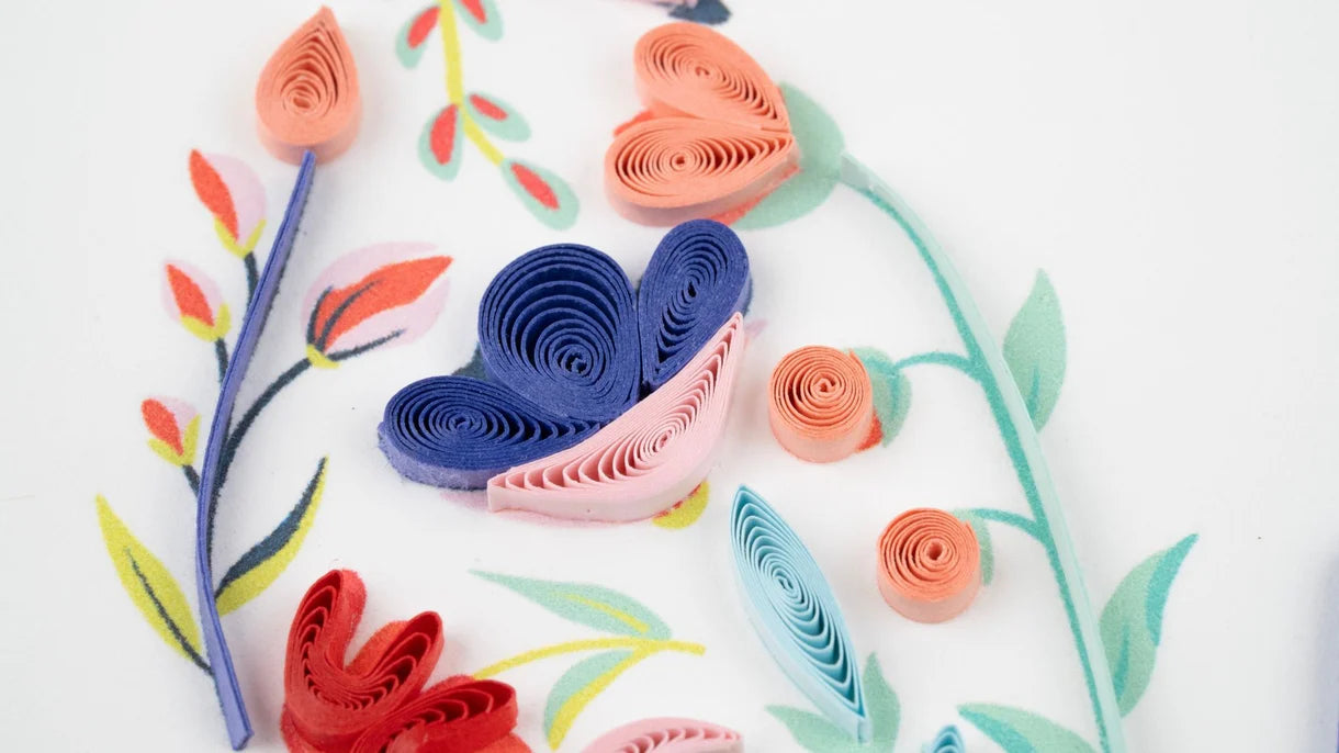 Colorful butterfly design on a white background with a pink border