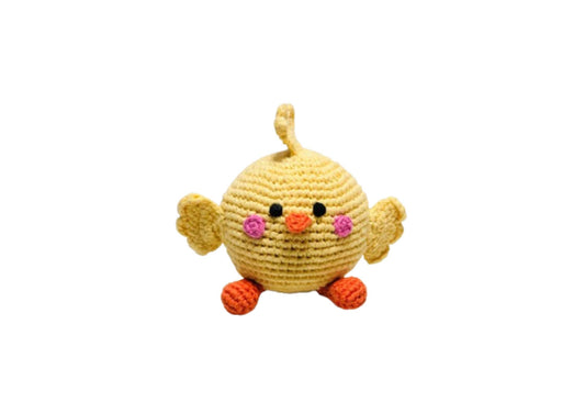 Crocheted yellow chick toy with black eyes and pink cheeks on a white background