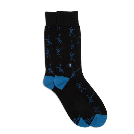 Black sock with small blue dancing skeletons