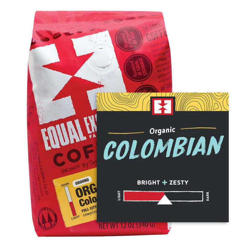 Two Equal Exchange Colombian coffee packages, one red and white, the other black and yellow, on a white background.