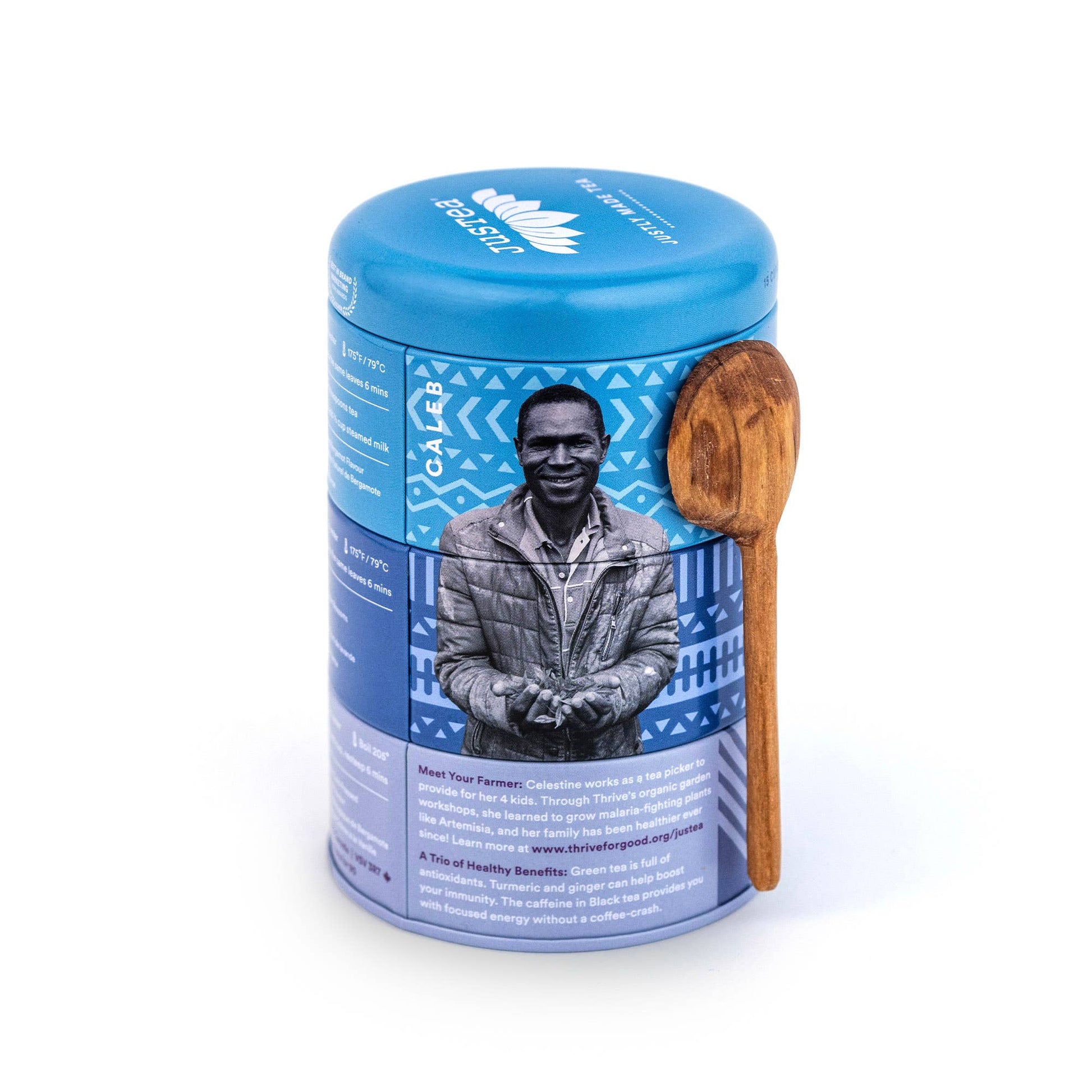 Blue tea canister with wooden spoon featuring a person on the label