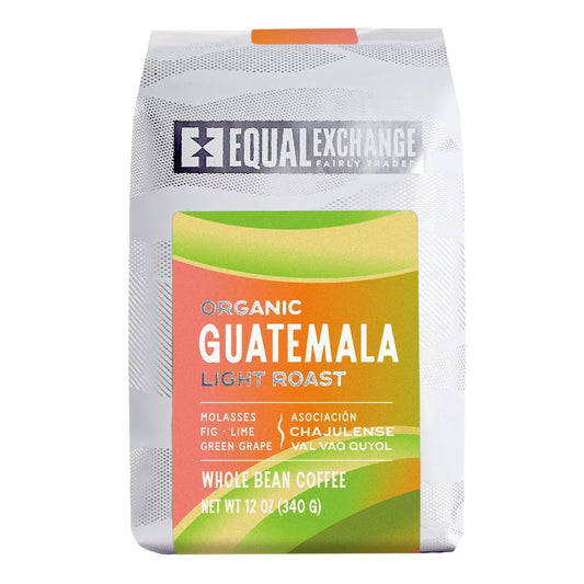 Equal Exchange Organic Guatemala light roast coffee white packaging with lime green, peach and orange decoration.