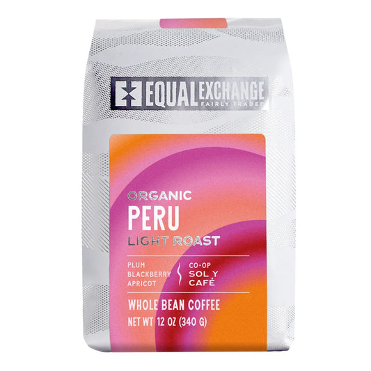 bag of peru light roast coffee beans in white bag with pink and orange accents