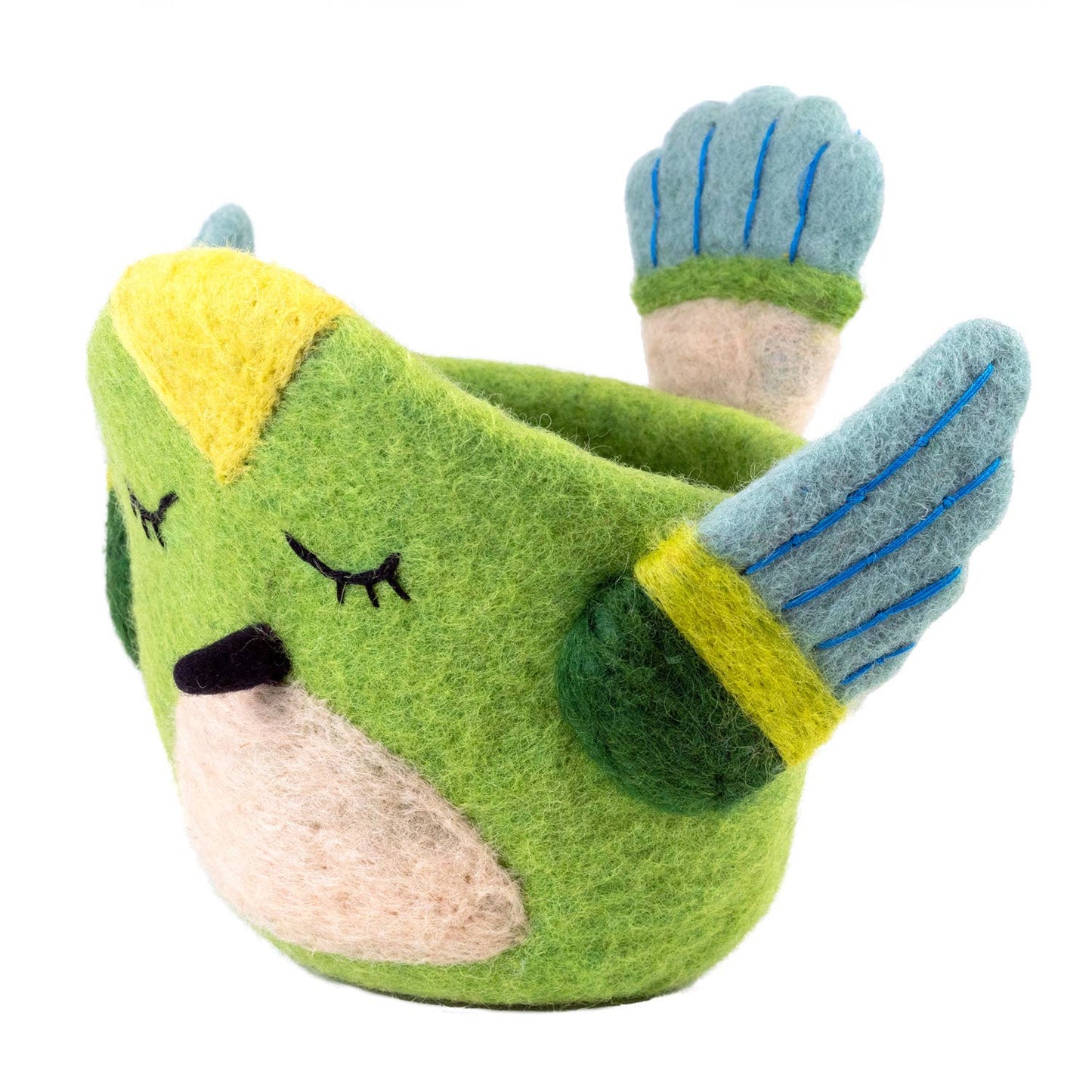 Green felted container with a face, wings, and a black beak on a white background