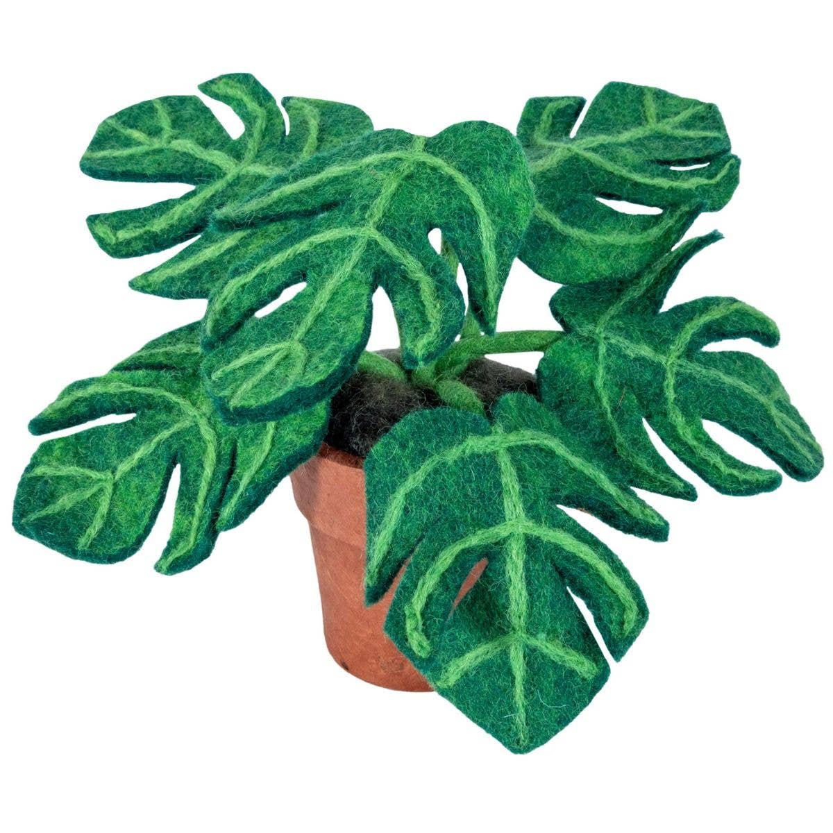 Felt monstera potted plant with green leaves on a white background