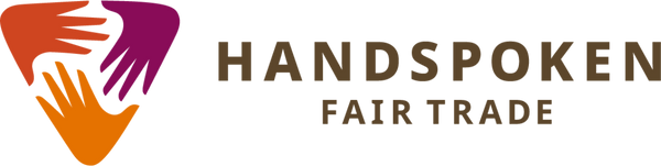 Handspoken Fair Trade logo with colorful hands on a white background
