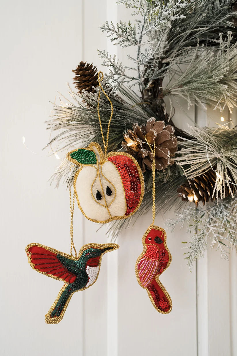 Beaded hummingbird ornament displayed as a colorful nature-inspired hanging decoration.
