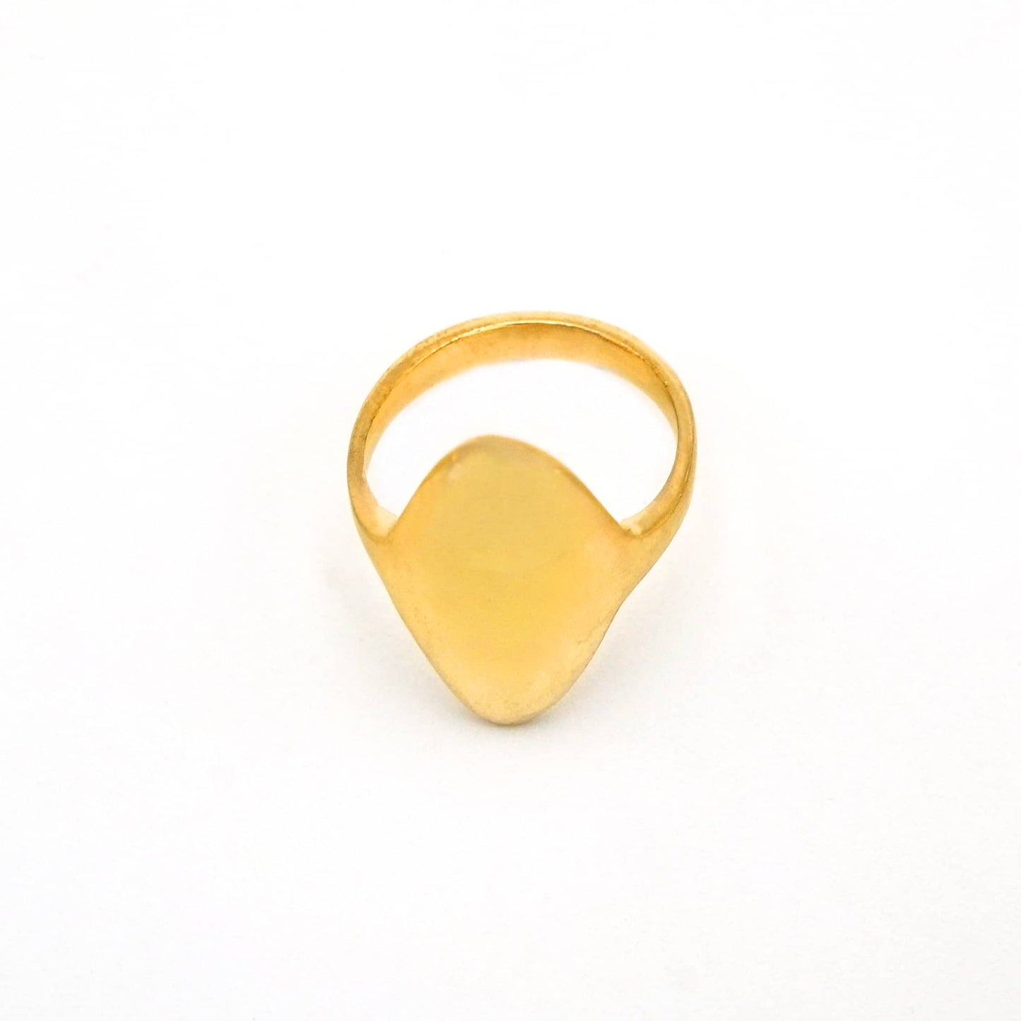 Gold ring on a white background