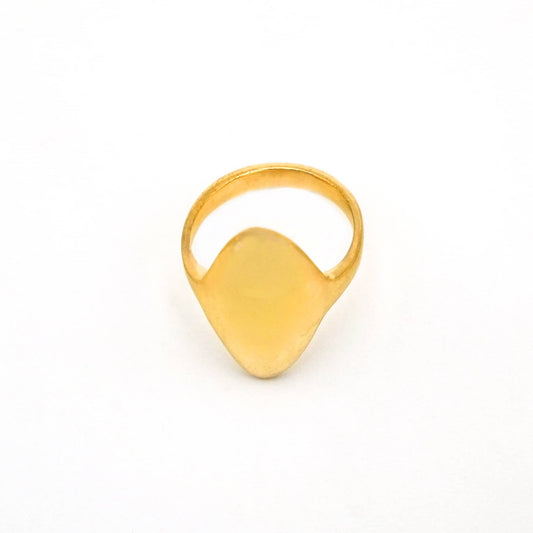 Gold ring on a white background