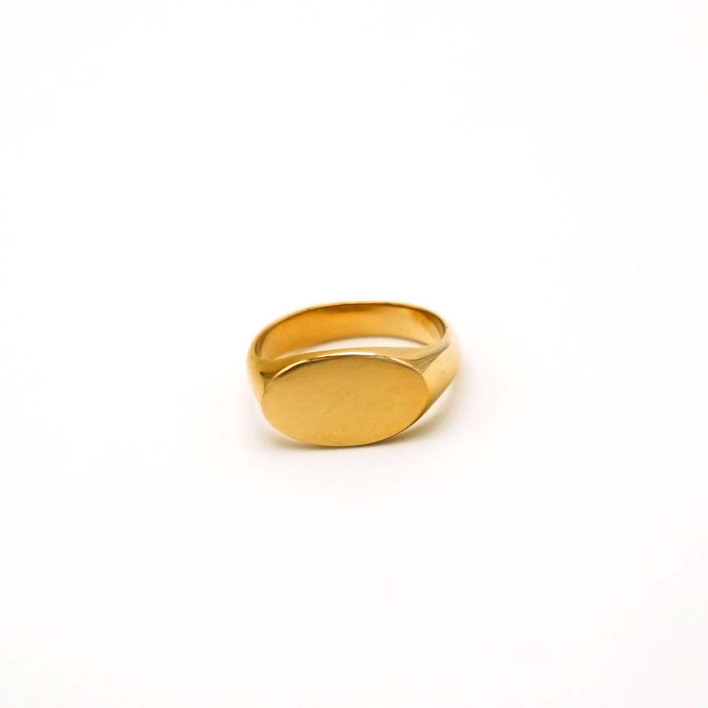 Gold ring on a white background