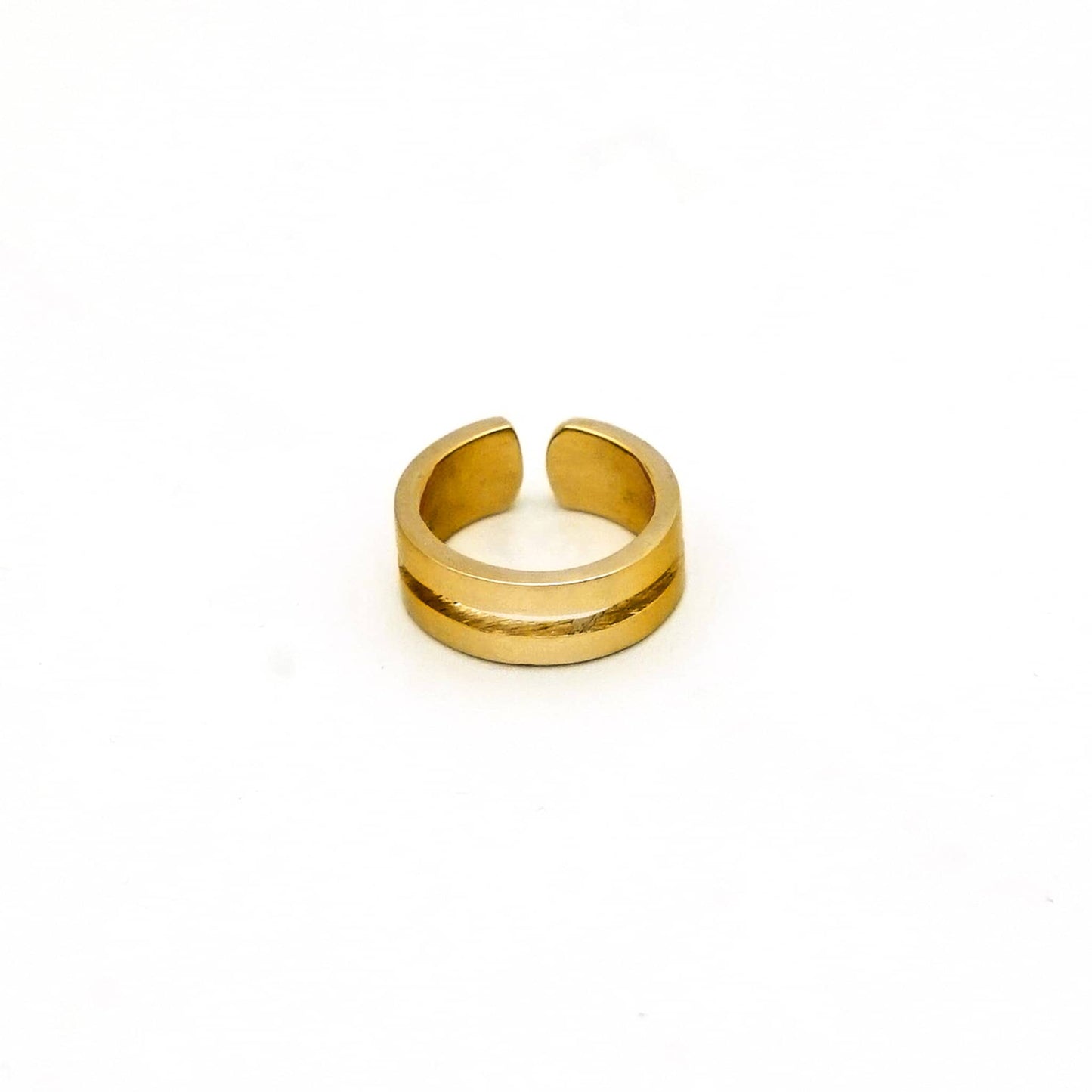 Gold ring on a white background