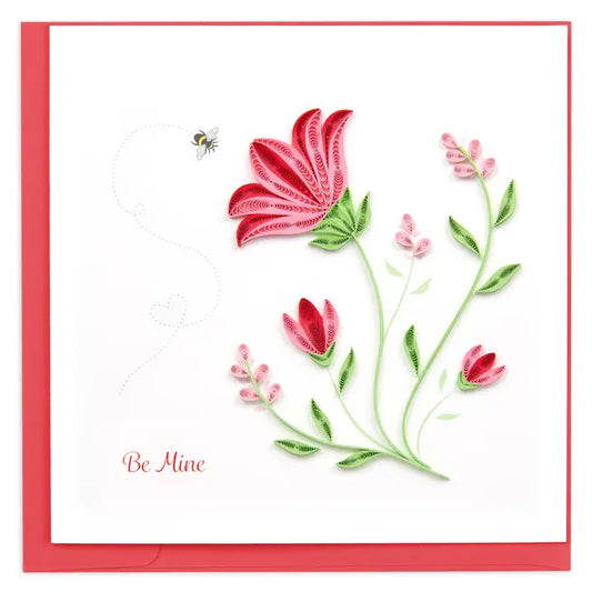 Floral design with red flowers and green leaves on a white background