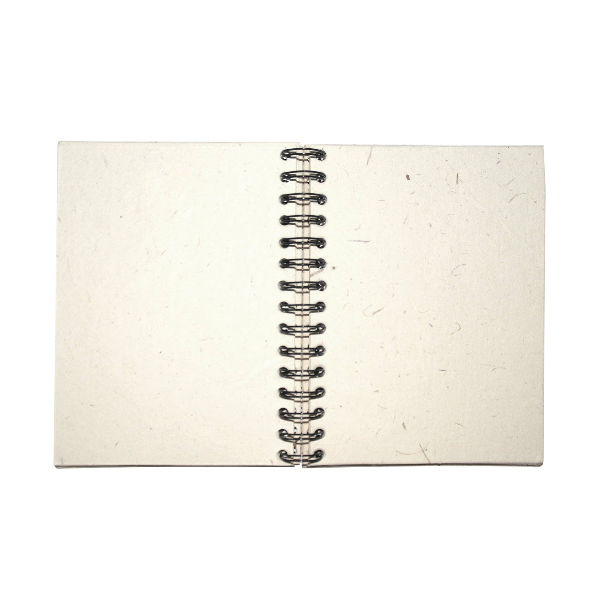 Open notebook with lightly textured pages and a black spiral binding on a white background