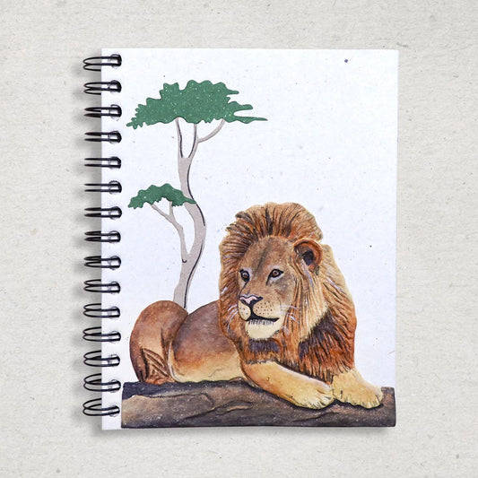 Notebook with a 3D lion illustration on a white background