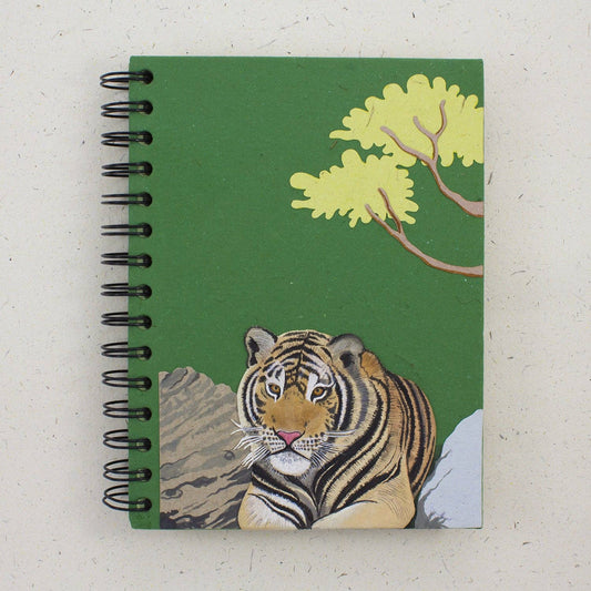 Green notebook with a 3D tiger illustration and black spiral binding on a white background