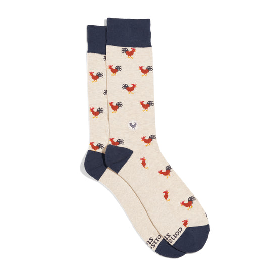 Pair of socks with rooster pattern on a white background