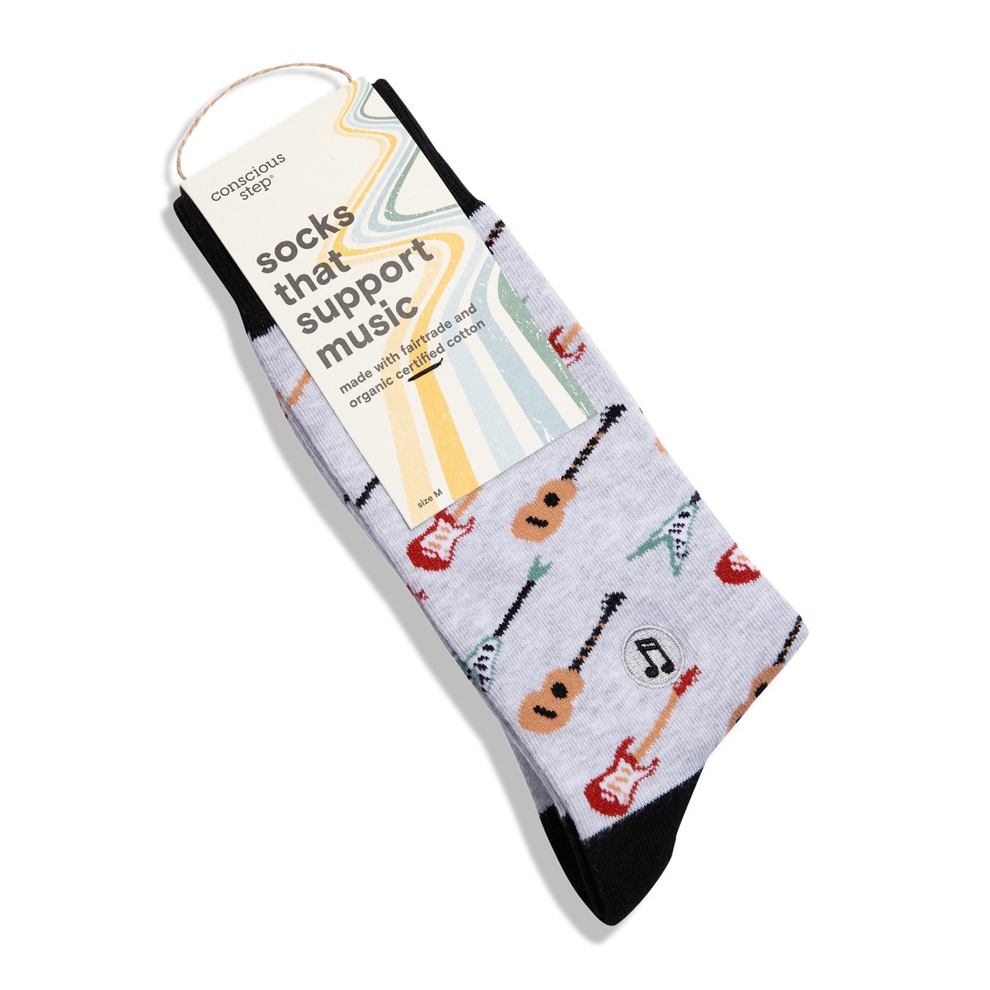 Music-themed socks with guitar designs on a white background