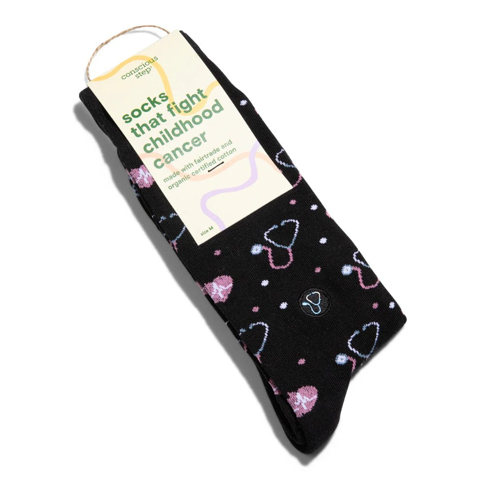 Black sock with heart patterns on a white background